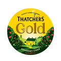 Thatchers Gold cider label with a scenic design and yellow background