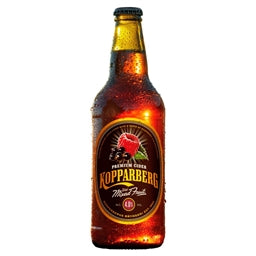 Bottle of Kopparberg Mixed Fruit cider with a red label on a white background